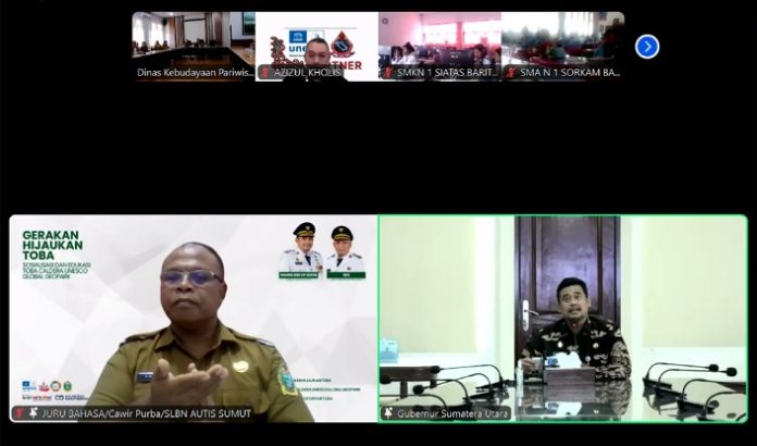 Teks Foto : Gubernur Sumatera Utara (Sumut) Bobby Afif Nasution pada kegiatan Sosialiasi dan Edukasi Toba Caldera UNESCO Global Geopark, yang digelar Dinas Kebudayaan Pariwisata dan Ekonomi Kreatif Sumut melalui platform Zoom Meeting, Selasa (03/06/2025. (Foto : Ist)